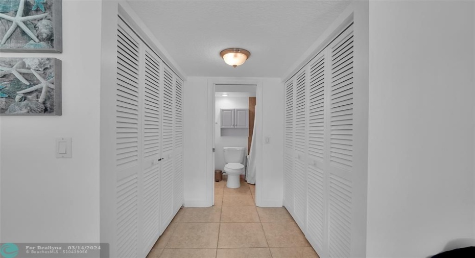 Double full wall closets in the primary bedroom