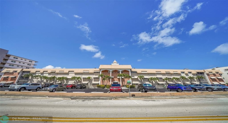 Residents and guests parking in front of the building