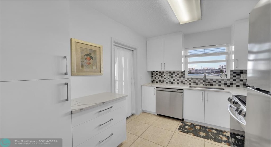 Modern kitchen with sunroom access