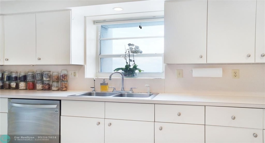 white kitchen with window