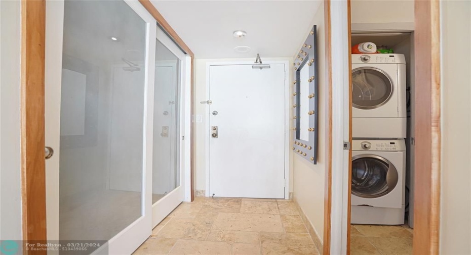 The half bathroom is on your left when you enter the apartment. A roomy entry way closet is behind those glass doors.