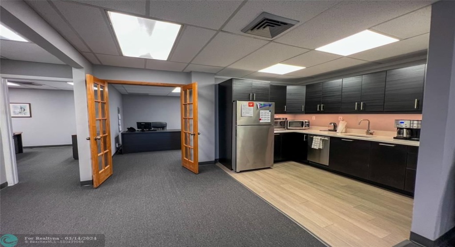 kitchenette area and access to private offices