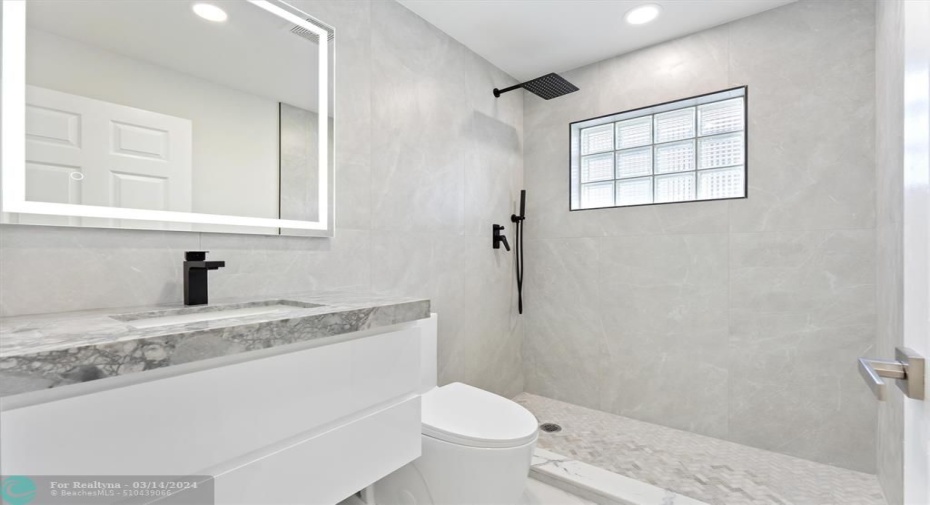Guest Bathroom - (Custom Glass Shower door missing in picture)