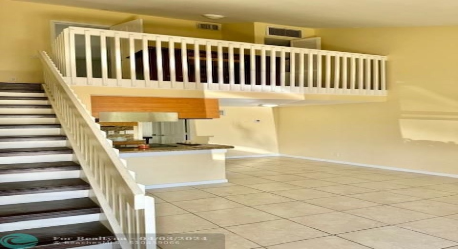 2 story living room with loft overlooking