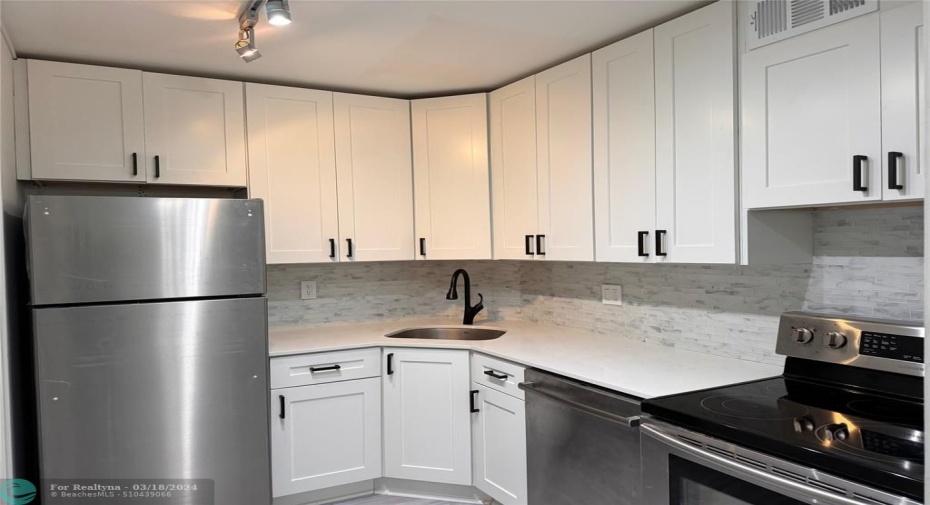 New Kitchen Cabinets counter/backsplash  New/ newer appliances