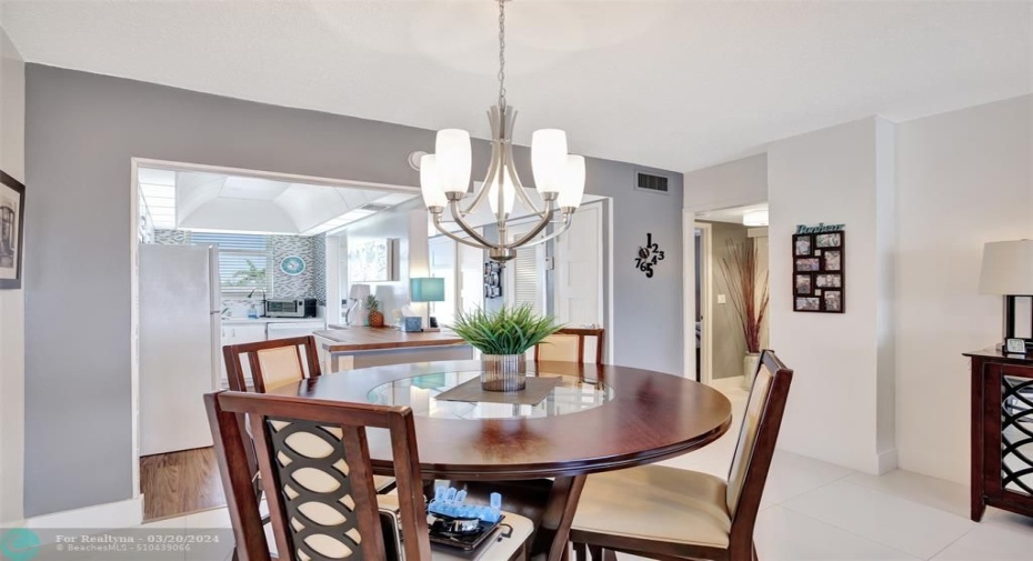 DINING AREA VIEW AND KITCHEN