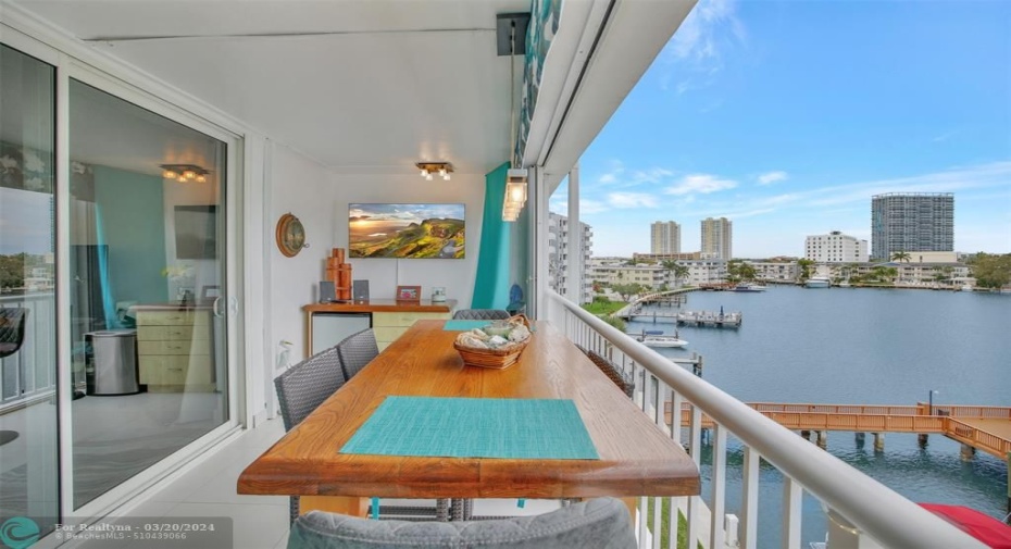 BALCONY WITH TV, FRIDGE AND WATER VIEWS