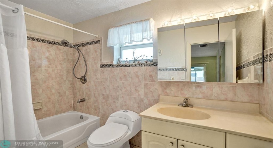Primary bathroom with tub/shower combination