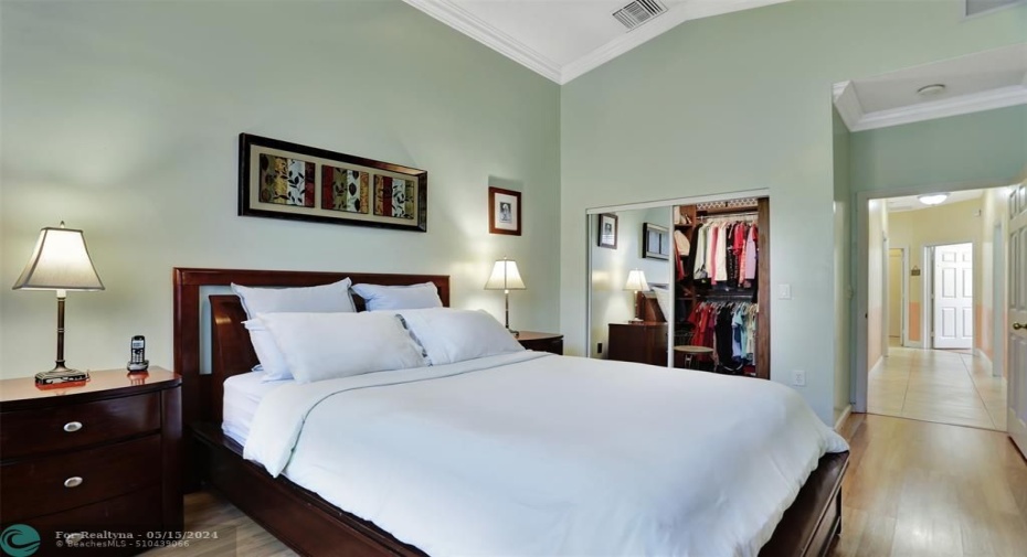 Spacious master bedroom located at the back of the house, faces east for sunrise view of the pool.