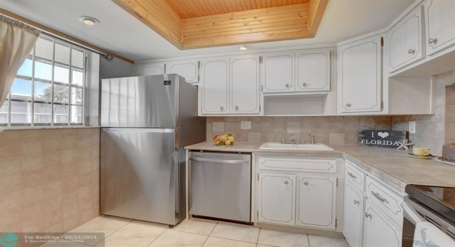 Kitchen with SAMSUNG stainless steel appliances. Pine tongue & groove ceiling!