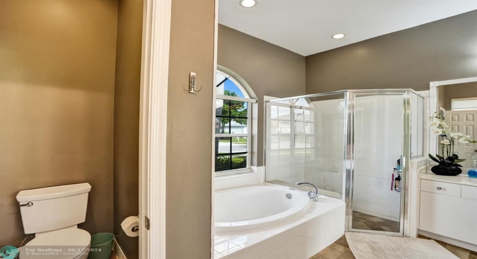 Complete Privacy: Tucked away for ultimate comfort is a separate, enclosed toilet, ensuring tranquility and privacy within your spa-like retreat.