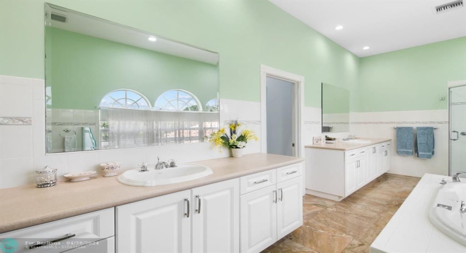Bright and airy Master Bedroom Bathroom. Impact windows face the cut-de-sac in this very peaceful and quiet Wilton Manors neighborhood!