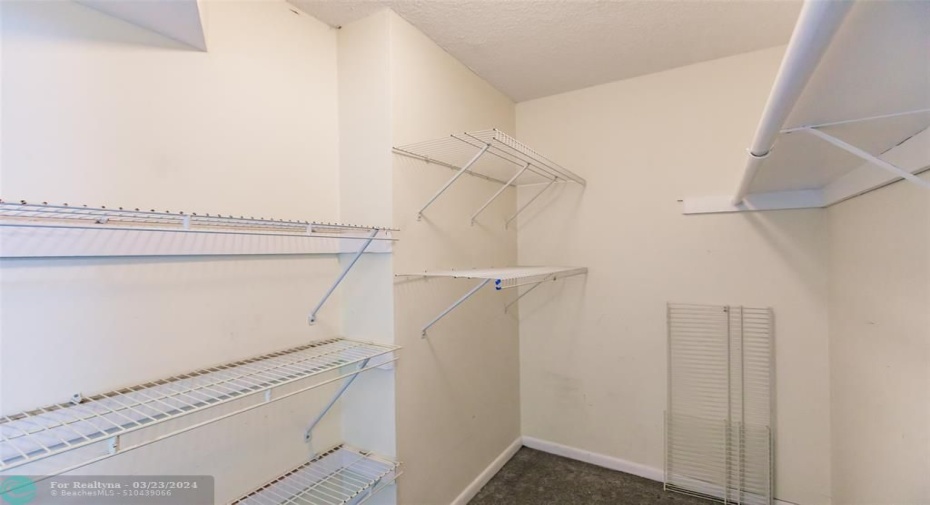 Large extra walk in closet in the hallway