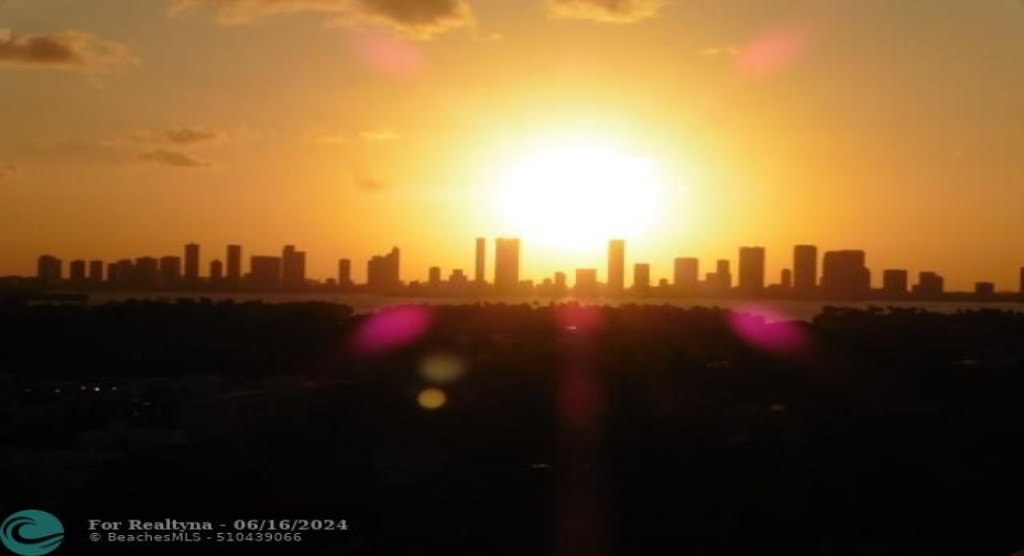 Close-up of sunset over Miami skyline.