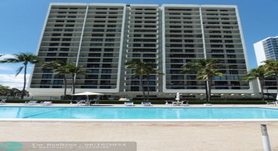 Poolside view of building.