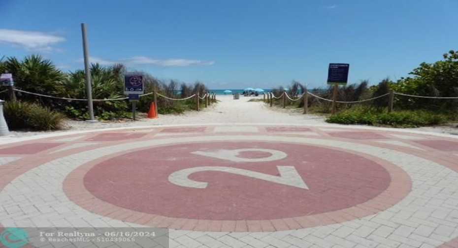 Entrance to beach at 26th St & Collins Ave.