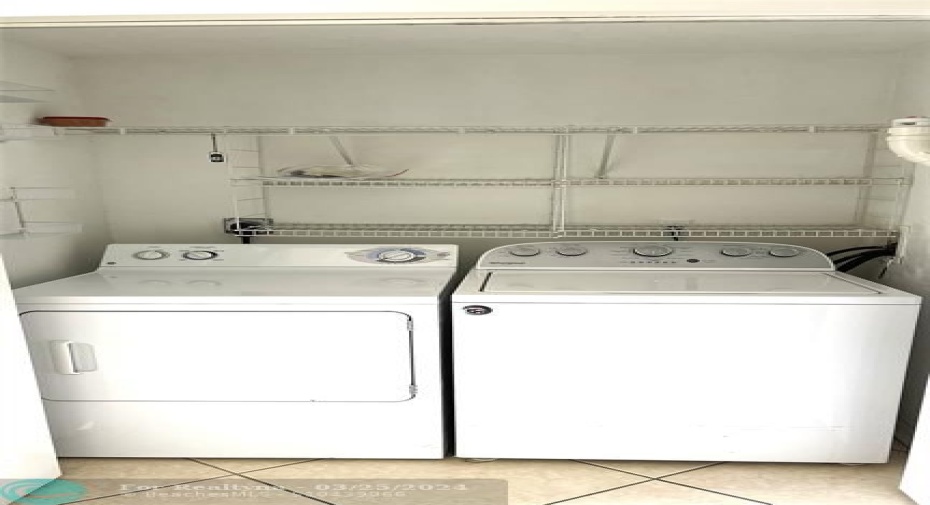 Clothes Washer and Dryer in a closet by the Kitchen
