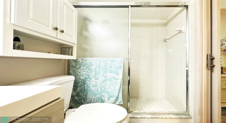 Glass Enclosed Shower w/Tiled Walls