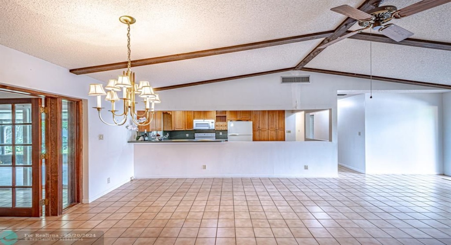Great potential to make the dining, kitchen and living room a grand entertainment space, the vaulted ceilings in both the family room and this area are just amazing and hard to find.