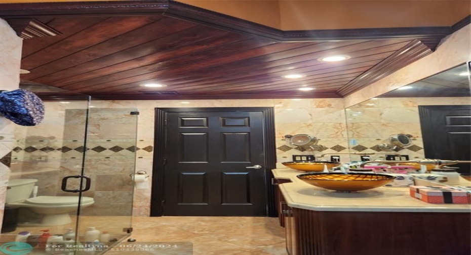 suite 1 master bathroom wood ceiling hi hats italian exotic rosea  wall and floor  marble