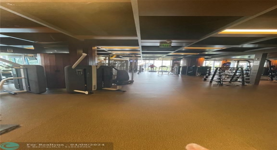 Another angle showing multiple pieces of equipment in Gym