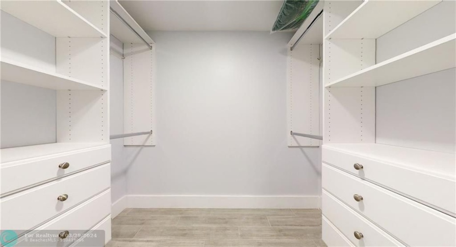 Walk in closet in the main bedroom with organizer to keep your clothes and shoes neat