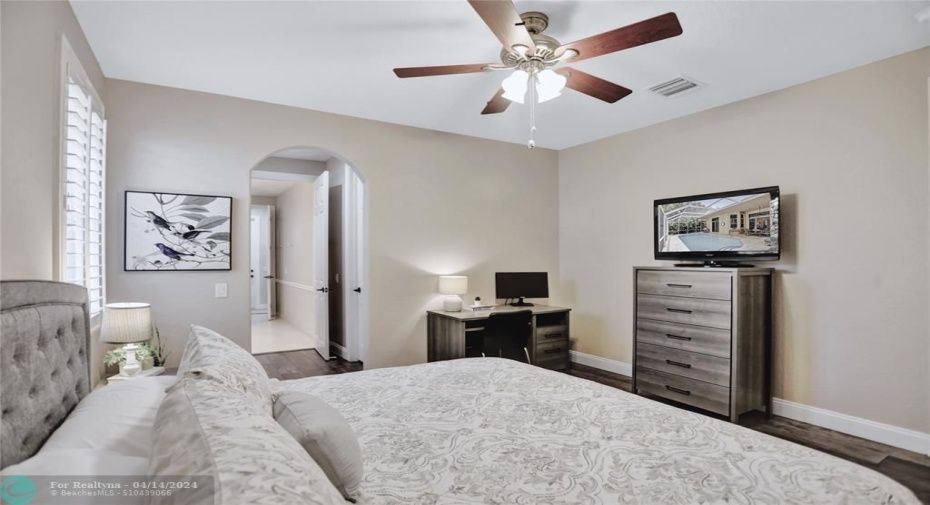 A serene bedroom, perfect for guests, in-laws or teen with 2 large closets (one walk in) and leads to cabana bathroom.