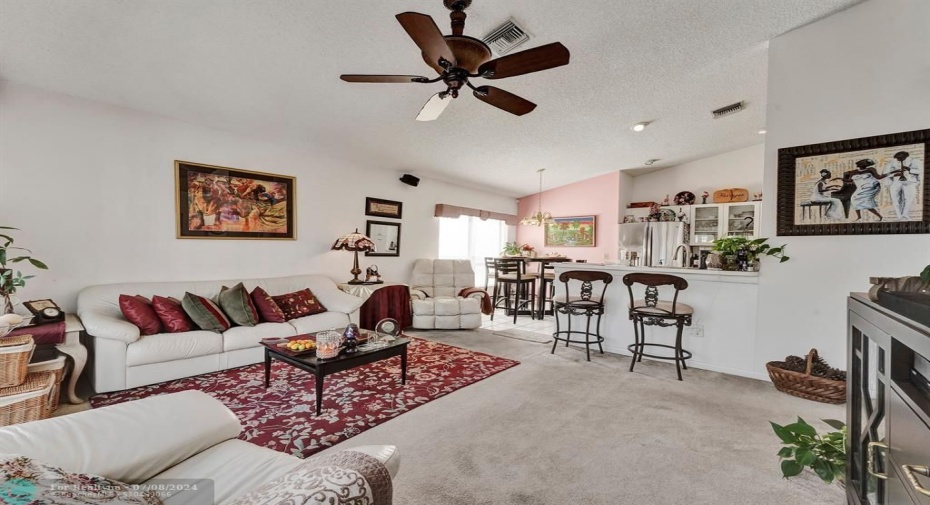 Create lasting memories in this inviting family haven!  The spacious family area offers a warm and inviting space for your family to gather, relax, and connect.