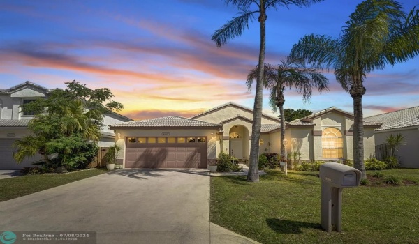 Unleash your Florida dreams at 4969 Broadstone Circle! This captivating 3-bedroom, 2-bathroom home in a sought-after West Palm Beach neighborhood beckons you inside. Step through the inviting entryway (future picture to reveal its charm!), and prepare to be dazzled. We'll explore every corner in the following pictures.