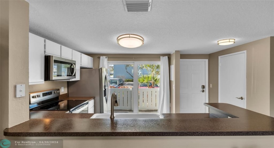 An abundance of natural light offered in this open and spacious kitchen