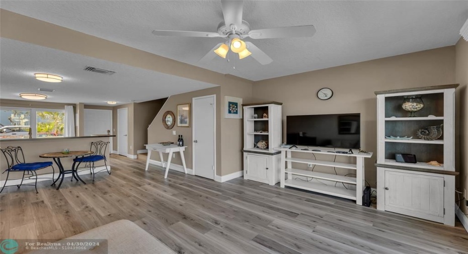 Great open space in main living area with wood like flooring