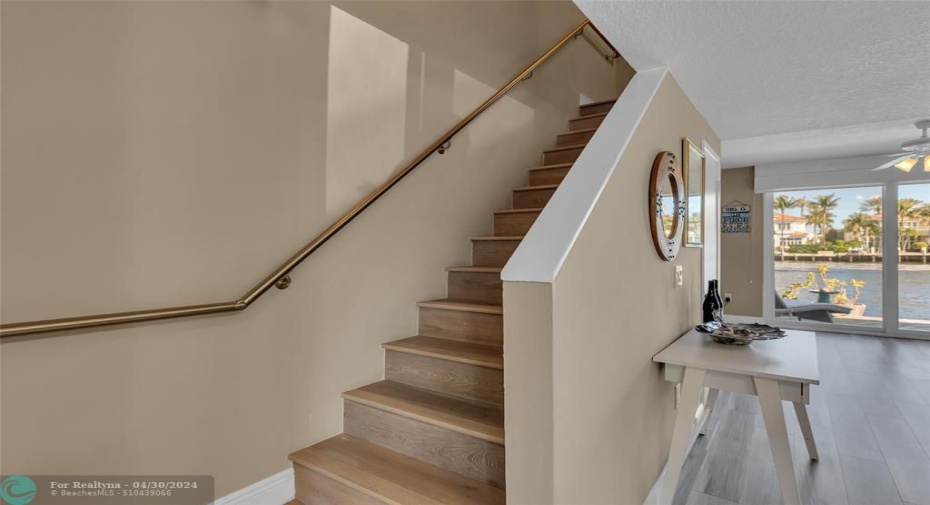 Stairs to bedrooms on the second floor