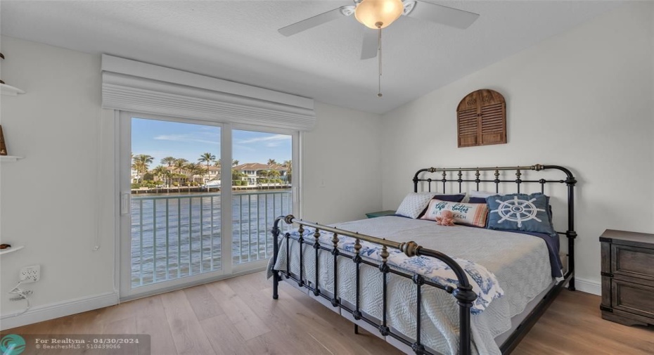 master bedroom with water views and great natural light