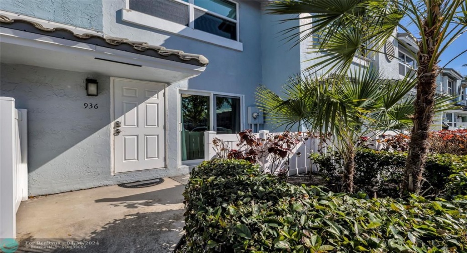 Front entrance to townhome and offers nice landscaping in the Boca Quay community