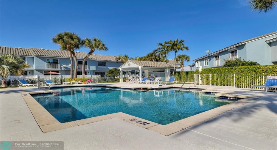 Community pool of Boca Quay located on water