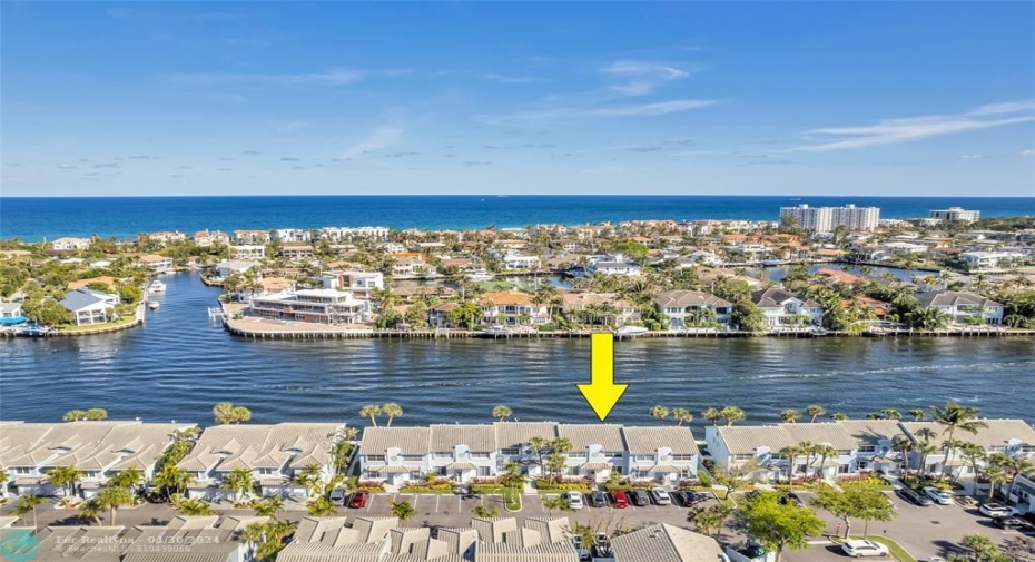 This waterfront townhouse is located directly on the main intracoastal and located in Boca Quay community