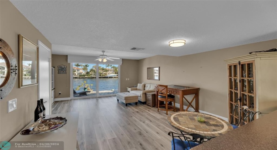 Dining room and living room offer spectacular views on the water