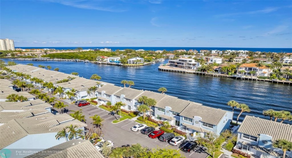 Main Intracoastal Community of Boca Quail with tropical landscaping