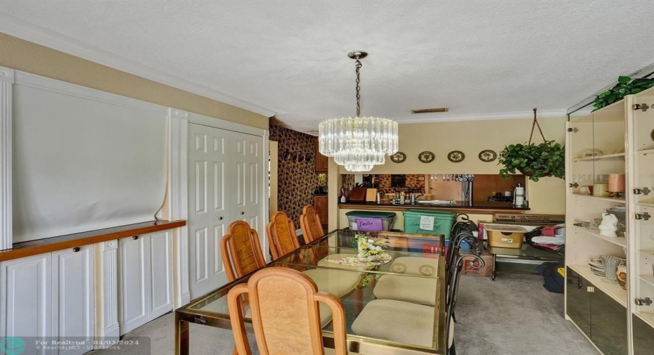 Huge dining area with pass through to the living room so you can keep the conversation going while in separate rooms.