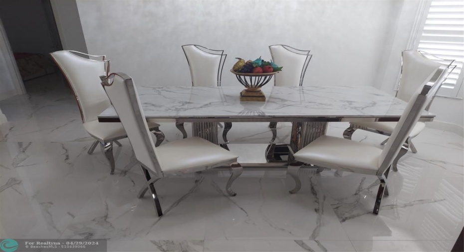brand new table and chairs, never sat-on or used, cost over $5000