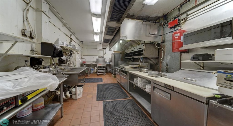 Full commercial Kitchen with  stove only 2 years old, refrigeration  with freezer.
