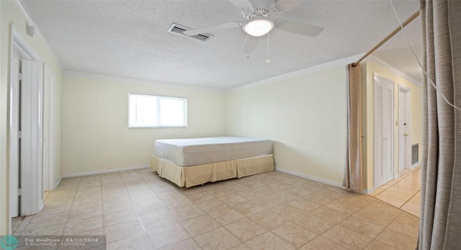 This room can be enclosed and used as a 3rd bedroom or used as an office