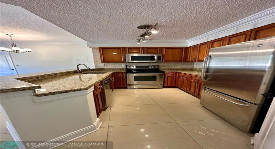 Recently renovated with granite counters & SS Appliances