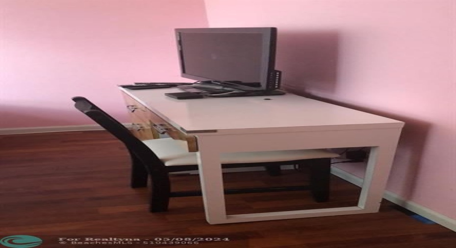 work desk and TV second bedroom