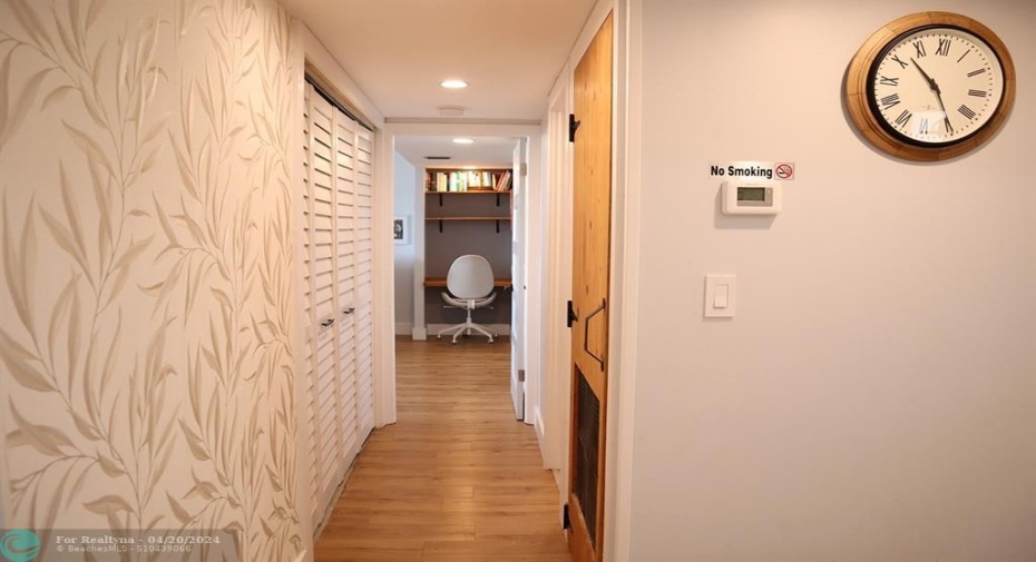 Hallway from Entry towards MBR with closets