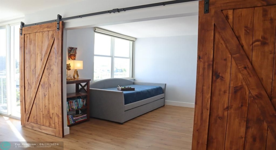 These Contemporary Sliding Barn Doors gives the Second Bedroom Ultimate privacy