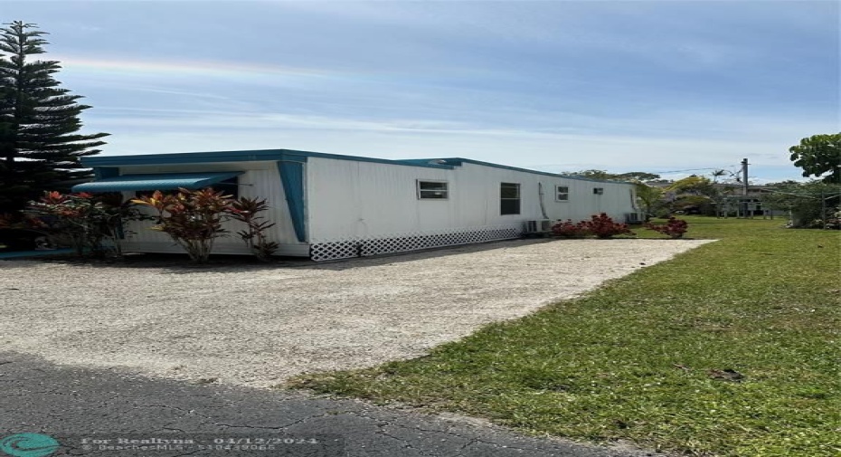 Driveway with parking for 2 cars.