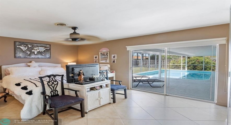 Welcome Home to your HUGE primary ensuite with 2 walk-in closets, overlooking the pool!