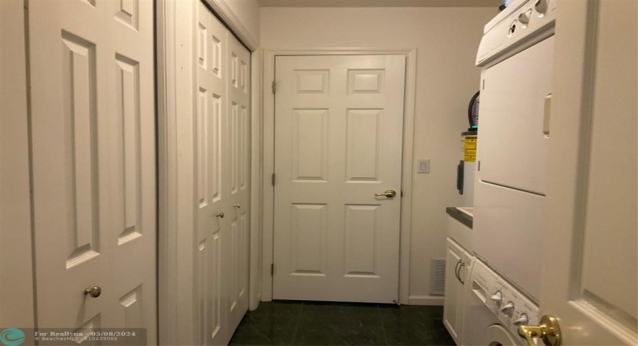 Pantry in inside laundry room off kitchen and hallway