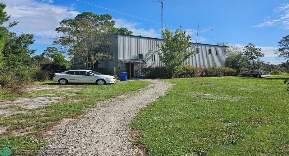 driveway to building from house